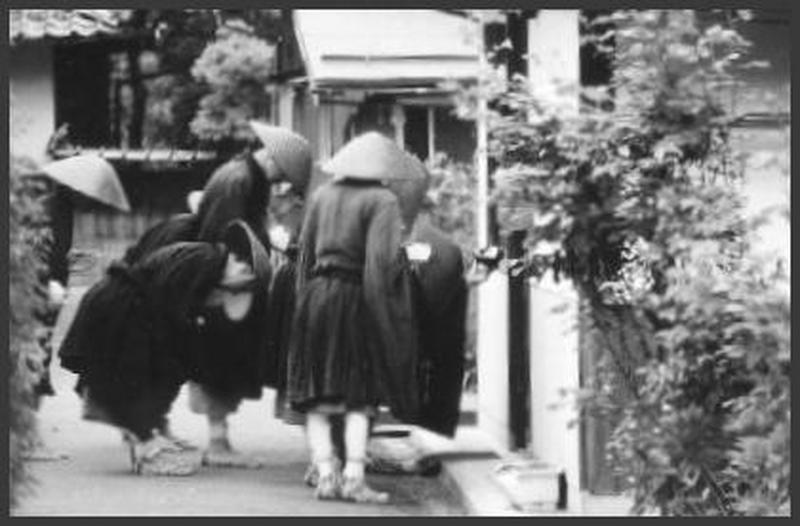 Takuhatsu in front of the hause